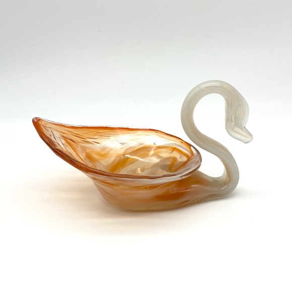 Small orange and white art glass swan
